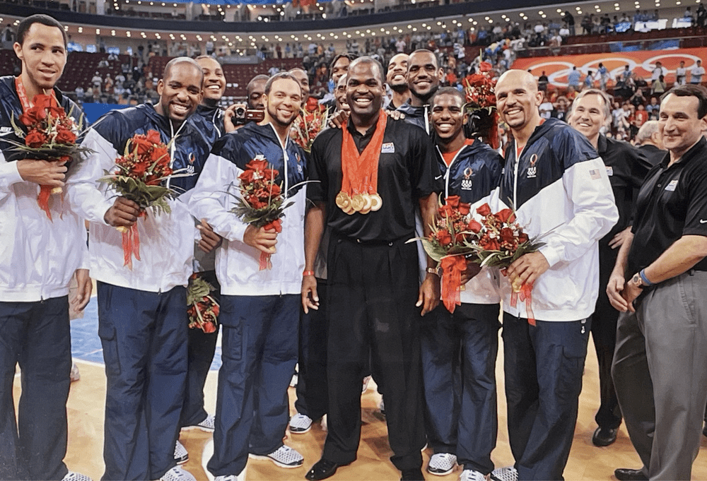 Nate McMillan with the U.S. Olympic team after winning gold